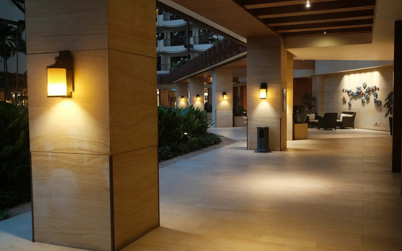 A warmly lit hotel lobby in Penang.
